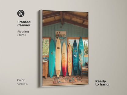 This framed canvas features a beach house interior. Vintage surfboards leaning against a wall. The floating frame is white. It is ready to hang. Perfect for adding coastal artwork to any room. A great conversation starter.