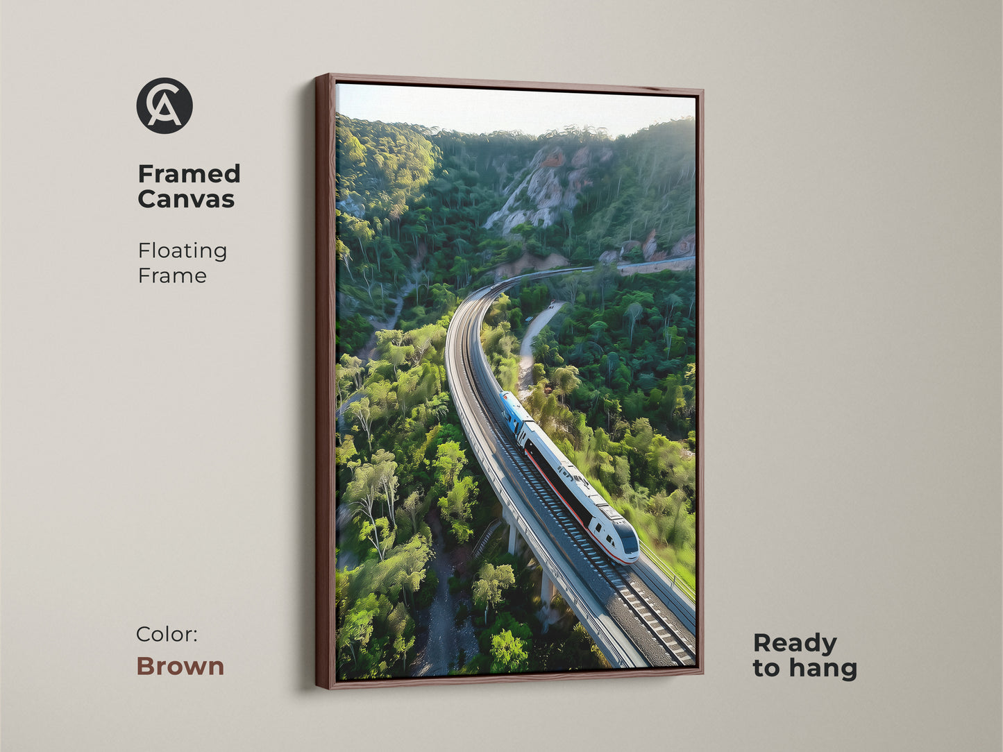 Elevate your home with this framed canvas art piece. The aerial train winds through a green mountain landscape. The floating frame in brown gives a warm contemporary feel. This artwork is ready to hang. It brings a touch of nature and adventure to any room. A perfect gift for train lovers.