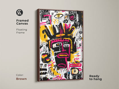 Framed canvas art featuring an abstract face artwork. A brown floating frame enhances the art. This modern artwork is ready to hang. The black face has pink details on a white background with colorful accents.