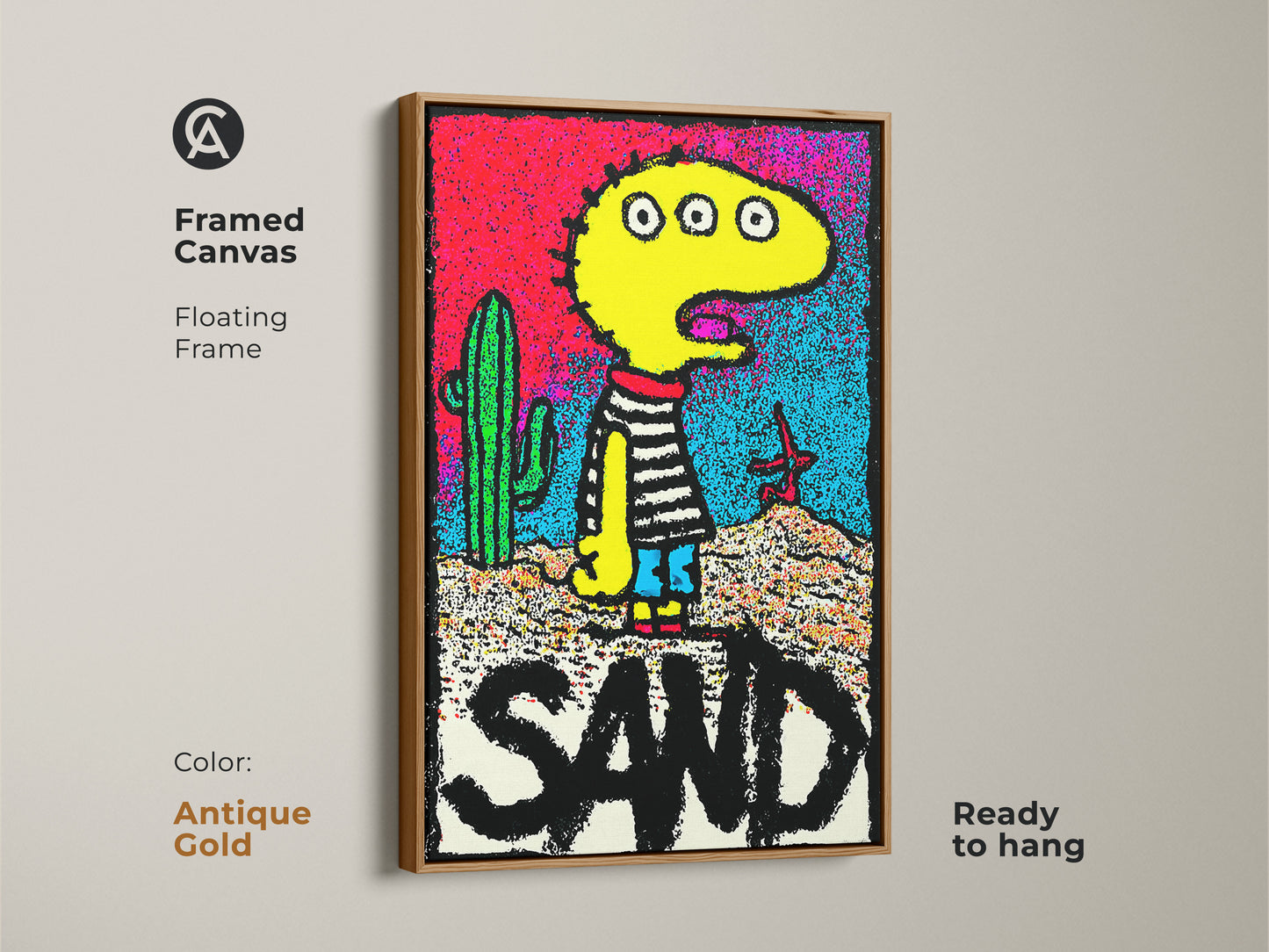 Framed canvas artwork with a floating frame featuring a three-eyed character in a desert scene. The art includes the word SAND and comes ready to hang. The antique gold frame adds elegance. Browse framed art prints for home decor.