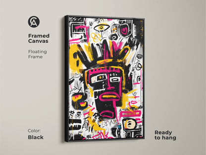 Framed canvas art featuring an abstract face artwork. The black floating frame enhances the art. This modern artwork is ready to hang. The black face has pink details on a white background with colorful accents.