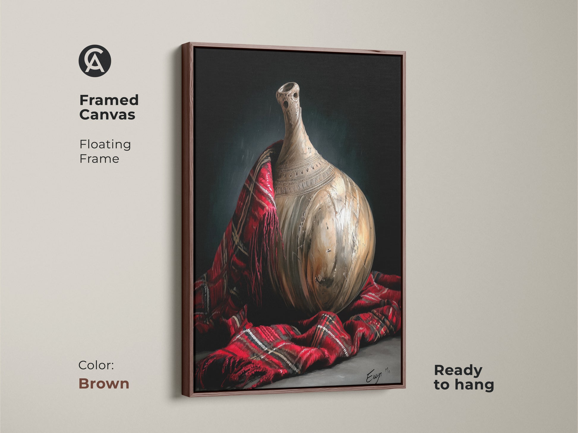 Framed canvas features a pottery vase draped with red plaid in a brown floating frame. This traditional realism artwork is ready to hang adds a warm touch to your eclectic home decor style artwork for collectors.