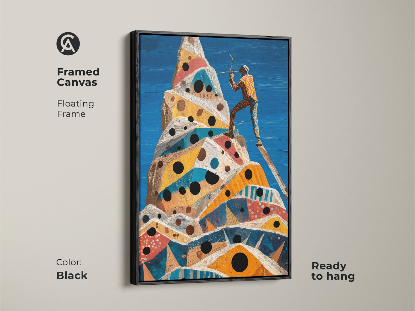 A framed canvas with a floating black frame displays surreal mountain climb art. The abstract geometric peak features an adventurer figurine. Ready to hang cobalt blue yellow orange artwork adds a modern touch.
