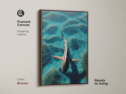 A framed canvas features a photorealistic shark in turquoise ocean waves. This aqua deep blue animal print has a floating brown frame. The contemporary coastal decor is ready to hang. A unique housewarming shark artwork gift idea for ocean enthusiasts.
