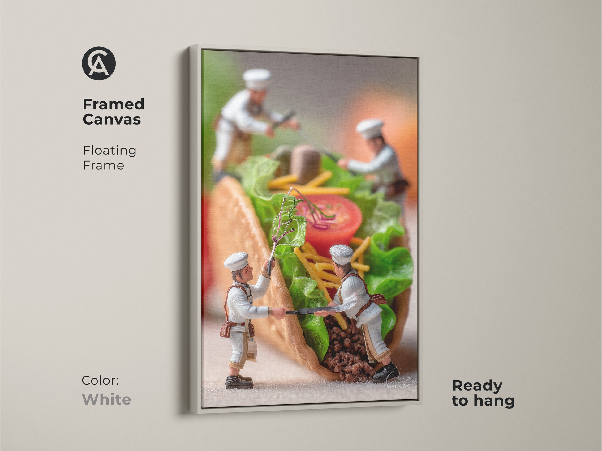 Framed canvas artwork showcasing miniature chefs assembling a taco in a white floating frame. This ready to hang piece brings culinary art to your walls. It's a modern twist on traditional art. Explore framed art today.