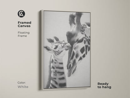 Framed canvas featuring a monochrome giraffe wall art print. It is a realistic pencil sketch of a mother and baby giraffe. Ready to hang this white framed artwork is a perfect gift for wildlife lovers bedroom animal print.