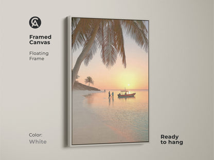 Framed canvas print of a beach sunset in a white floating frame. The coastal artwork features a palm tree boat and people on the beach. This ready to hang tropical ocean scene adds tranquility to your home. It makes a thoughtful housewarming gift for beach lovers.