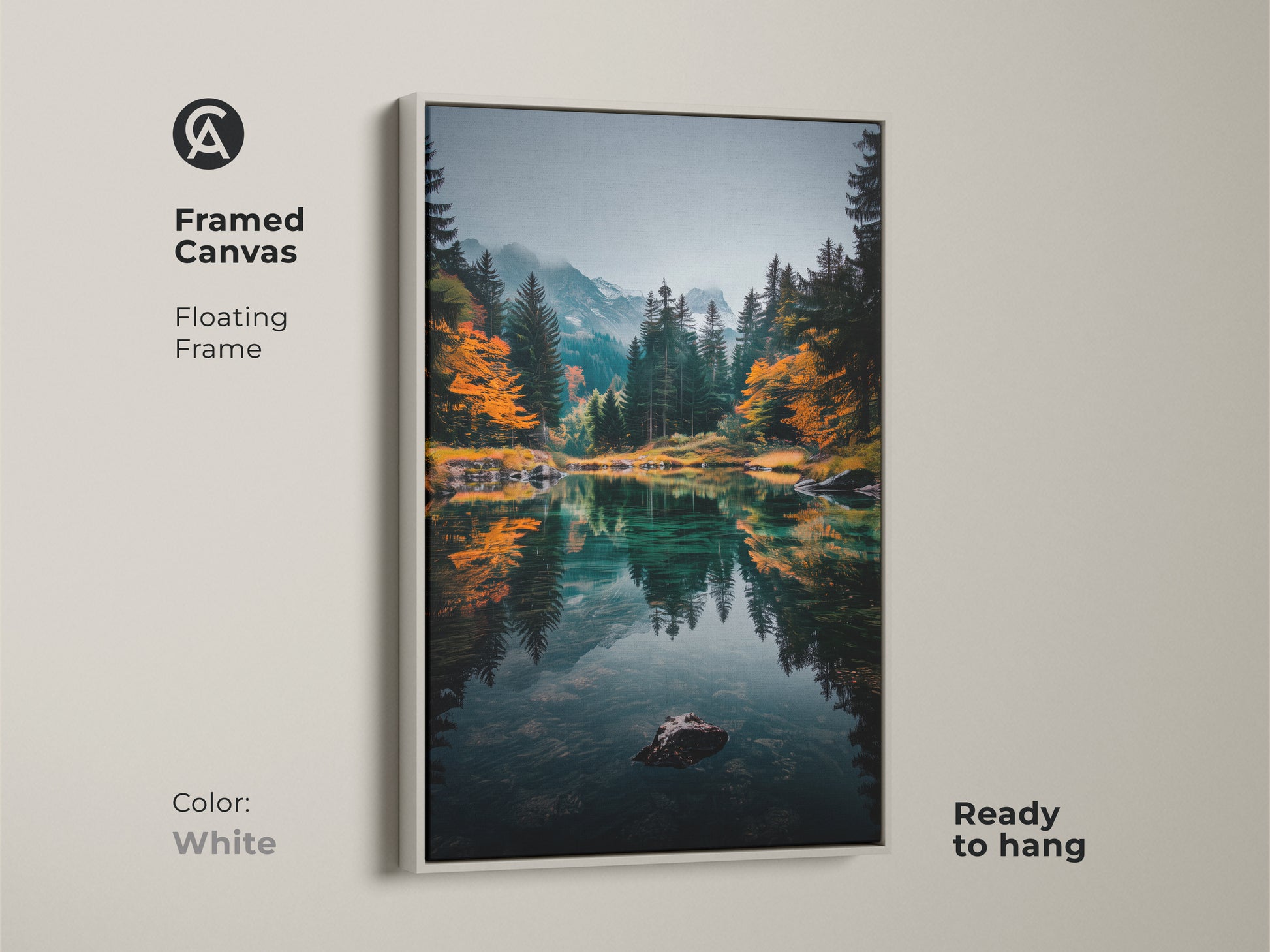 Brighten your living space with this framed canvas artwork. The floating frame in white complements the serene mountain lake scene. The artwork captures a tranquil lake reflecting the surrounding forest and mountains. It's ready to hang and enjoy. Elevate your home decor