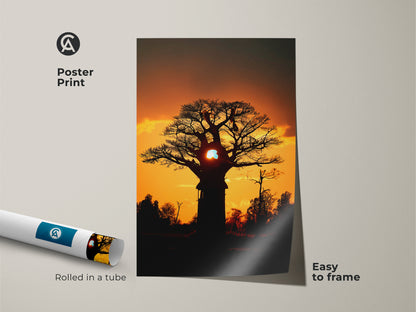 Poster print of a silhouetted baobab tree against a dramatic sky. Rolled in a tube and easy to frame. Perfect orange yellow nature print for eclectic spaces. This african sunset baobab tree art brings the savanna to your home. A unique wall hanging art piece.