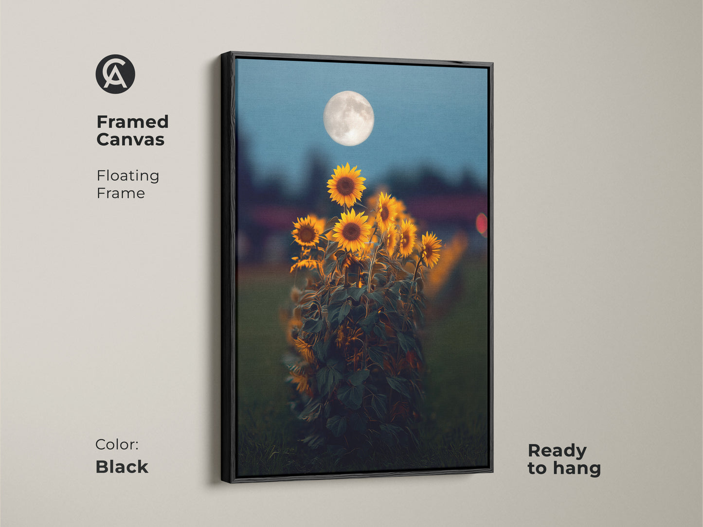 Framed canvas with a floating frame showcasing sunflower moon art. The black frame complements the dreamy celestial artwork. This yellow orange floral art is ready to hang. A perfect bohemian home decor art for your living room or bedroom wall.