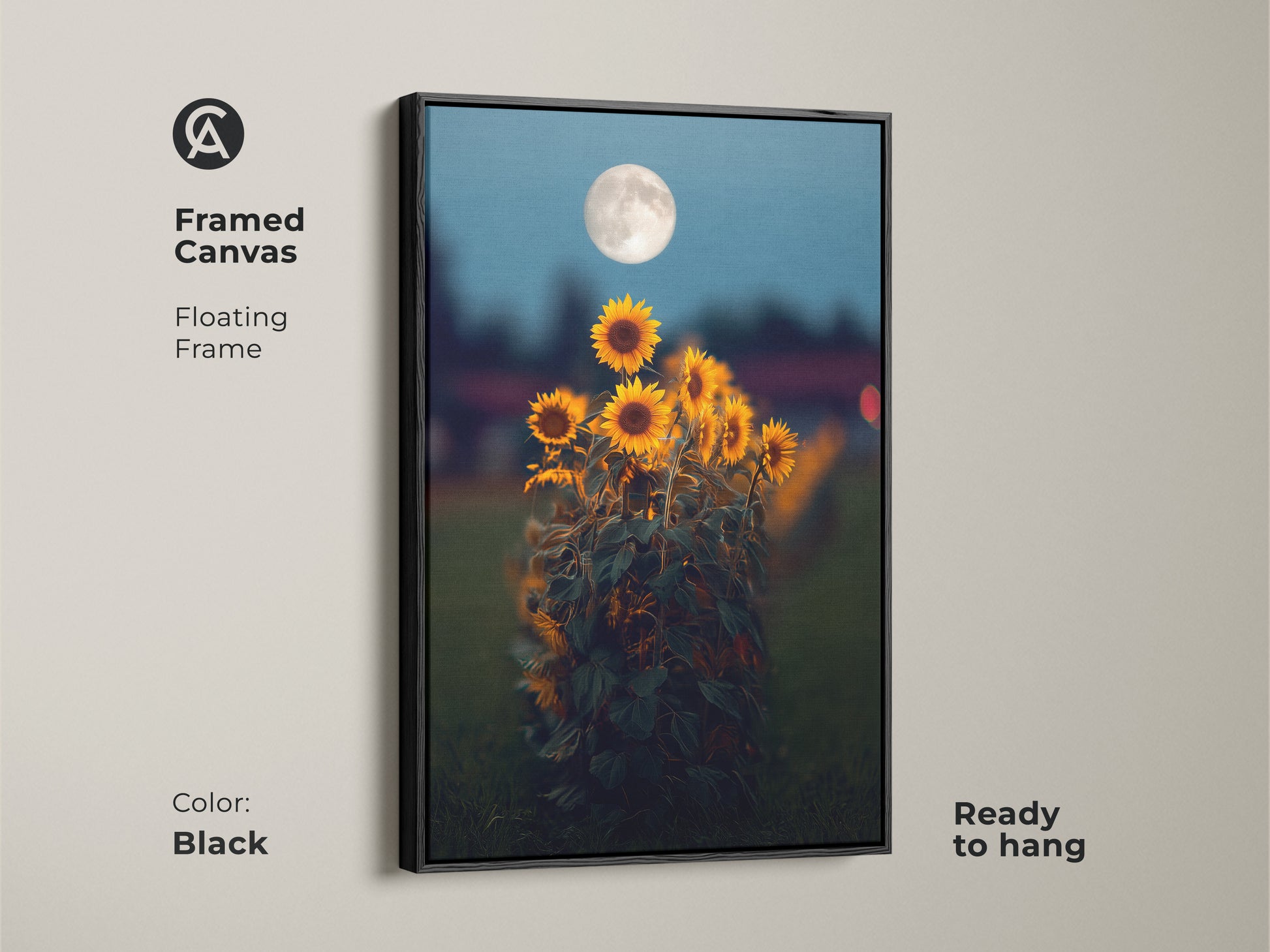 Framed canvas with a floating frame showcasing sunflower moon art. The black frame complements the dreamy celestial artwork. This yellow orange floral art is ready to hang. A perfect bohemian home decor art for your living room or bedroom wall.