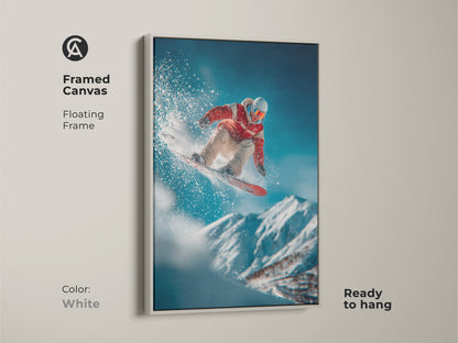 Framed canvas art shows a snowboarder in mid-air. The white floating frame offers a clean modern look. Ready to hang this artwork brightens any space. Perfect for contemporary action art lovers.