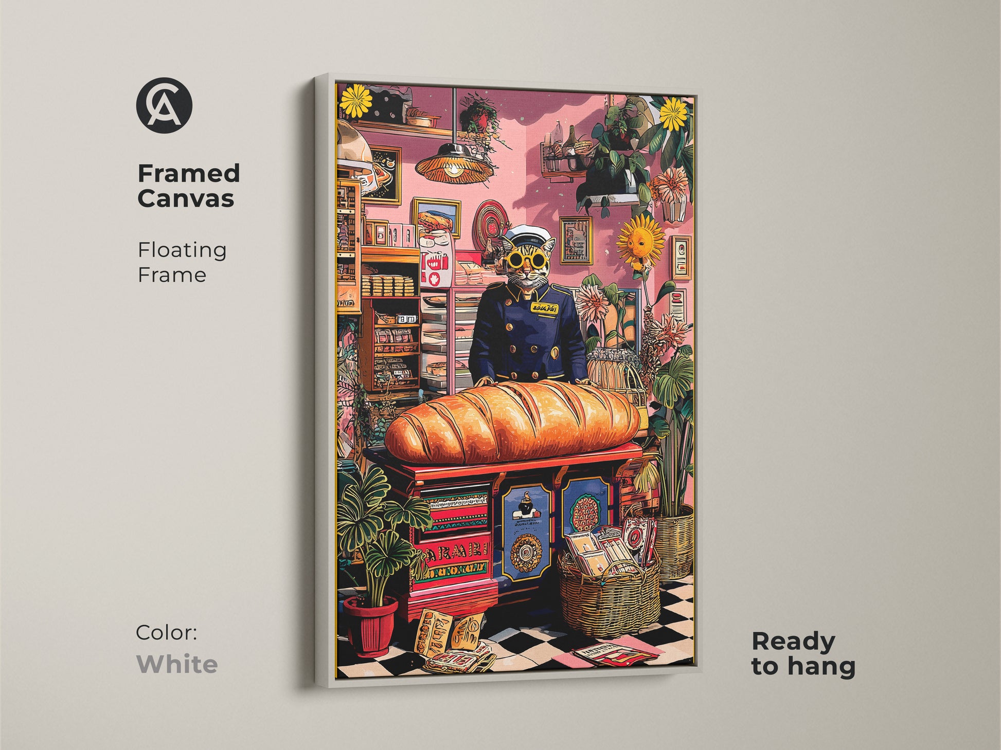 A framed canvas Cat Baker Art Print with a white floating frame. This artistic kitchen poster is ready to hang. It features a surreal cat baker in an orange and yellow kitchen. It makes a funny cat lover gift.