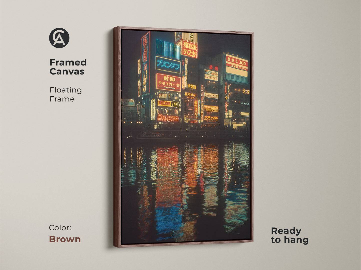 A canvas print in a brown floating frame displays urban Japanese neon artwork. The cityscape at night is reflected in the water. The blue yellow orange contemporary art is ready to hang. It's a travel gift idea.