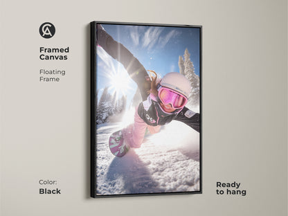 Framed canvas of a snowboarder in action. The black floating frame adds a sleek touch. This dynamic winter sports print is ready to hang. Ideal wall art for snowboarder bedrooms and living areas.