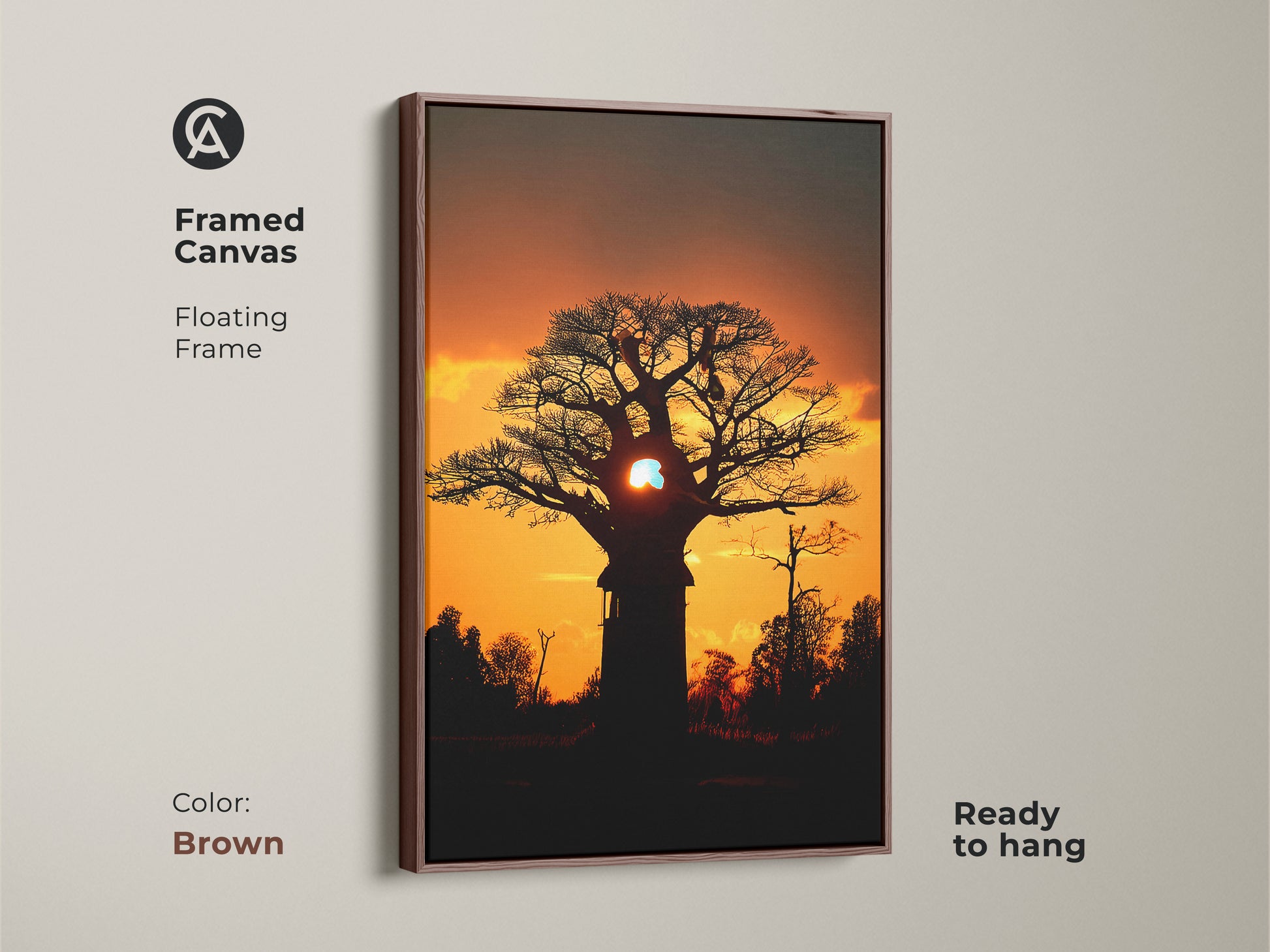 Framed canvas featuring a silhouetted african sunset. Brown floating frame enhances the wildlife nature artwork. Ready to hang and perfect for eclectic home wall art. This baobab tree art brings warmth to any space. Ideal as landscape wall art for a bedroom.
