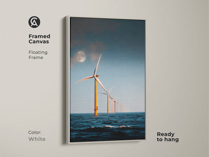 White Framed Canvas of Moonlit Ocean Wind Turbine Artwork. This modern minimalist seascape art showcases offshore wind turbines under a moonlit sky and is ready to hang. It's a unique eco home gift that brings an industrial landscape to contemporary spaces.