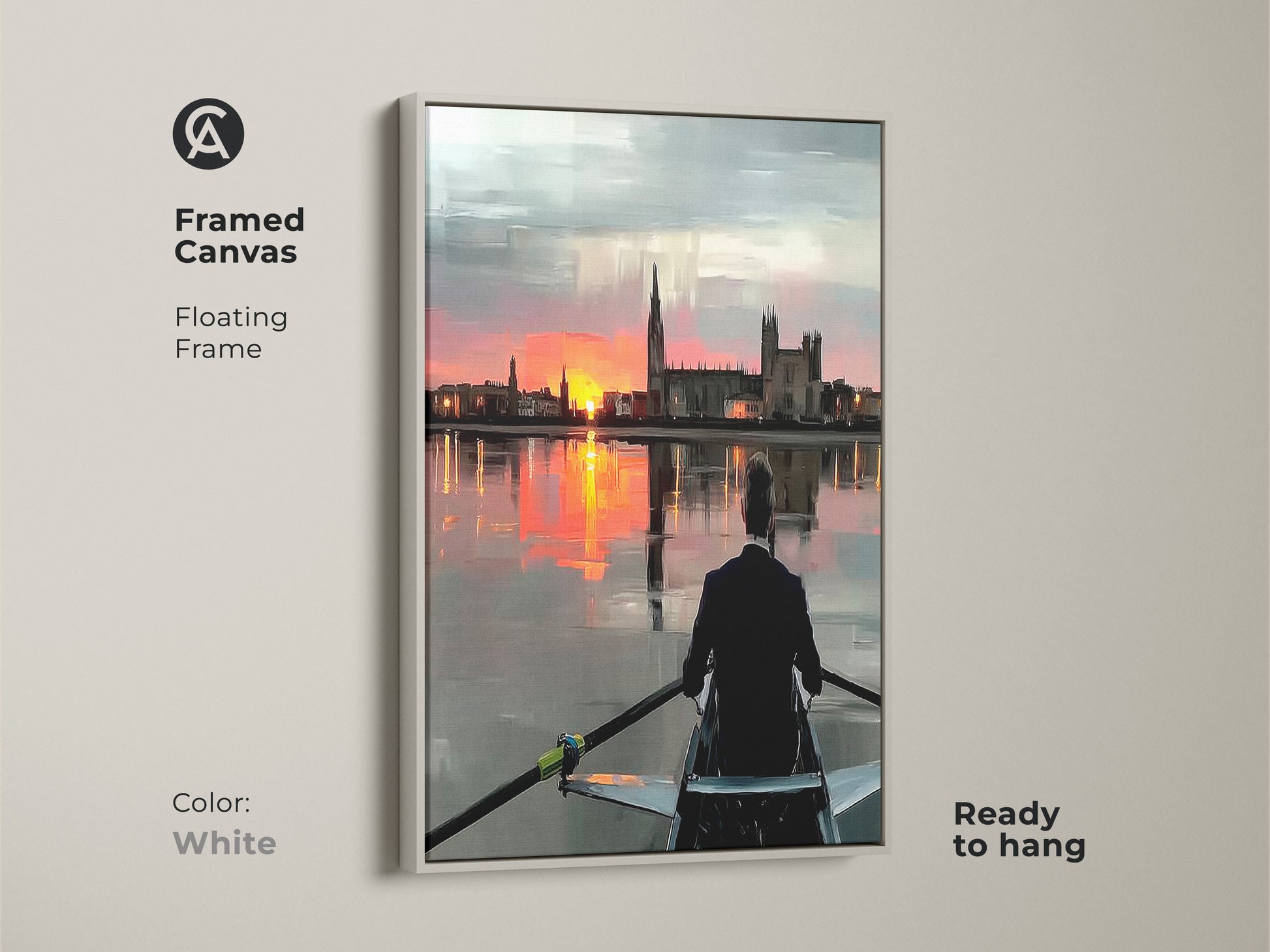 Framed canvas featuring rowing sunset art with a floating white frame. The impressionistic landscape canvas is ready to hang. The modern orange pink and grey tones make it a versatile piece. The cityscape sunset print elevates any office. A perfect gift for rowers and athletes. A contemporary office art piece.
