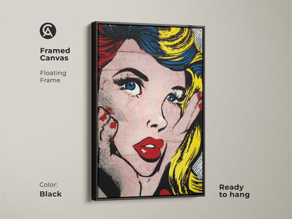 Framed canvas featuring Pop Art Woman with a black floating frame. Ready to hang this artwork adds sophistication to any room. The artwork depicts a woman in the iconic pop art style. This framed canvas brings a touch of modern art to your home decor