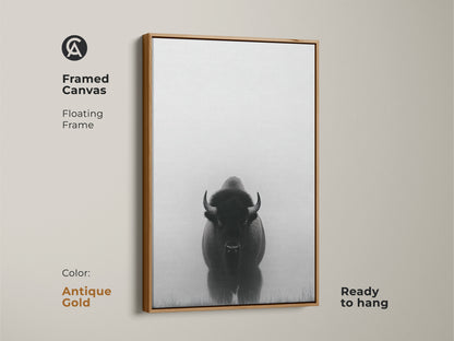 This framed canvas shows minimalist bison art with an antique gold frame. This black and white prairie canvas is ready to hang. The wildlife animal landscape print creates a rustic farmhouse feel.