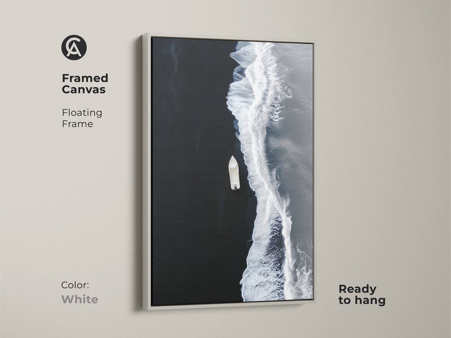 White framed canvas of minimalist ocean artwork. A floating frame accents the aerial boat view. Ready to hang coastal beach decor for a modern seascape print.