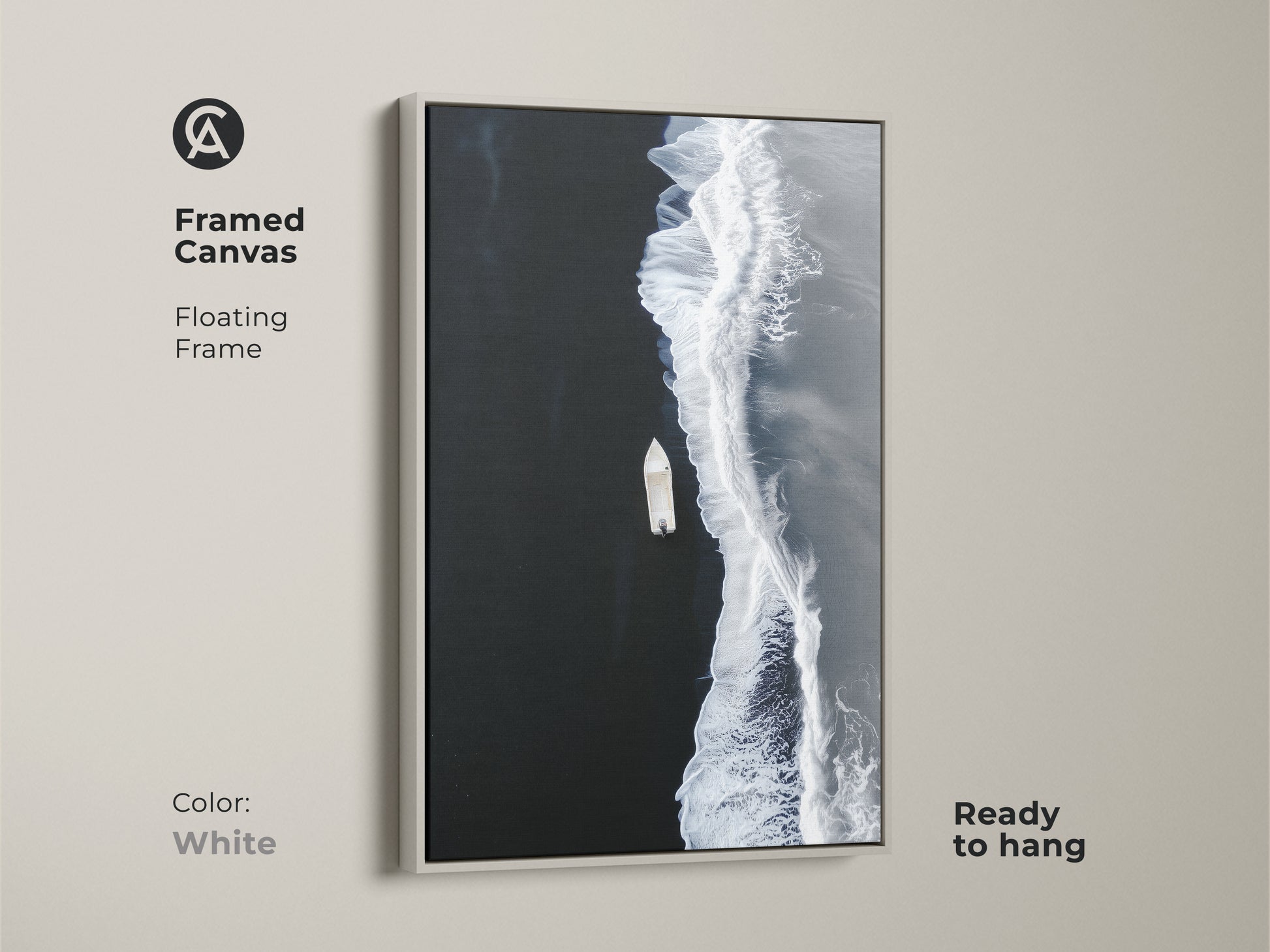 White framed canvas of minimalist ocean artwork. A floating frame accents the aerial boat view. Ready to hang coastal beach decor for a modern seascape print.