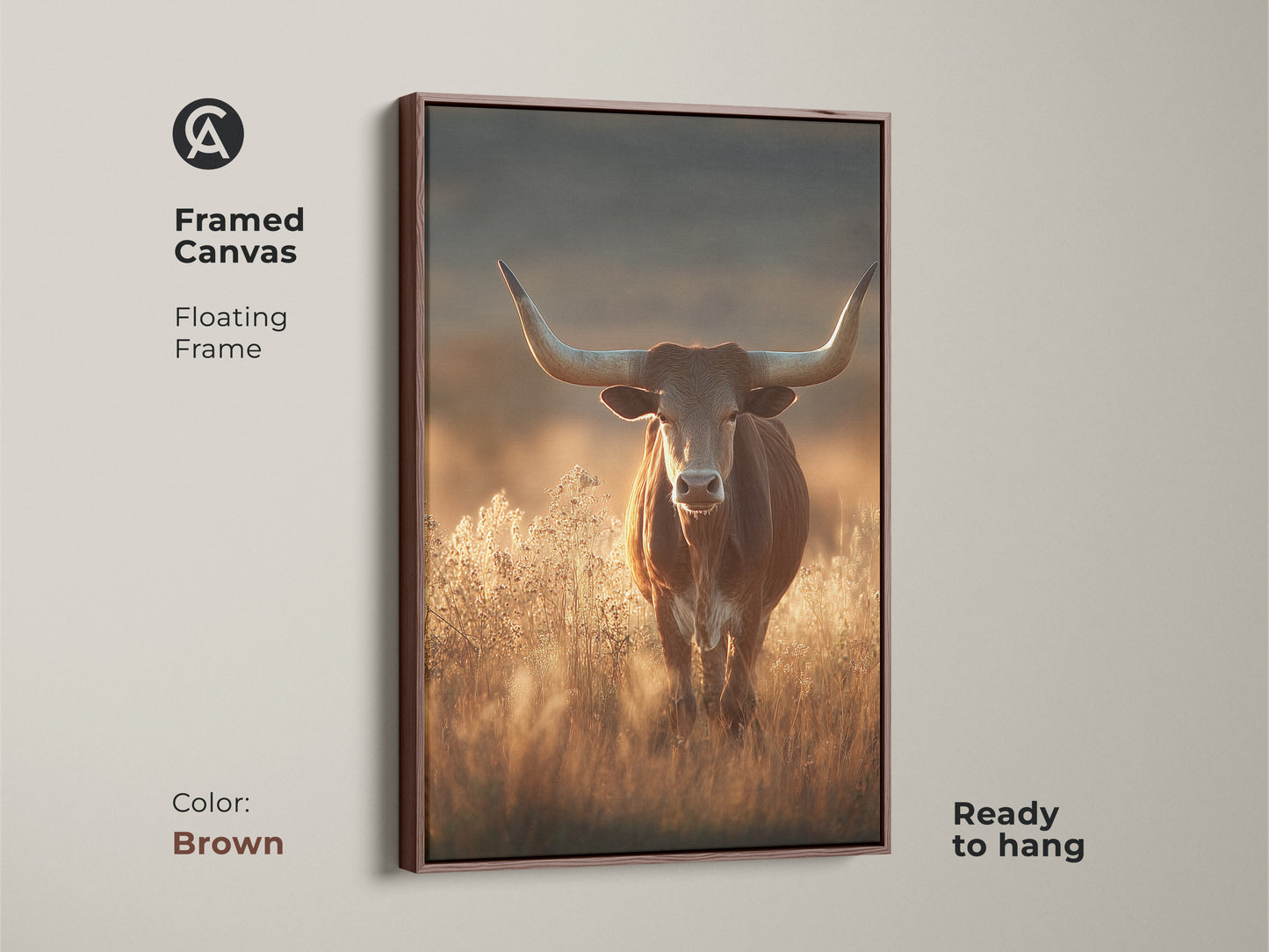 Framed canvas art of a longhorn bull in a savanna. This rustic western wildlife art features earthy tones and a brown floating frame. The warm brown art print is ready to hang. It will add character to any room. This is perfect as rustic wall art.