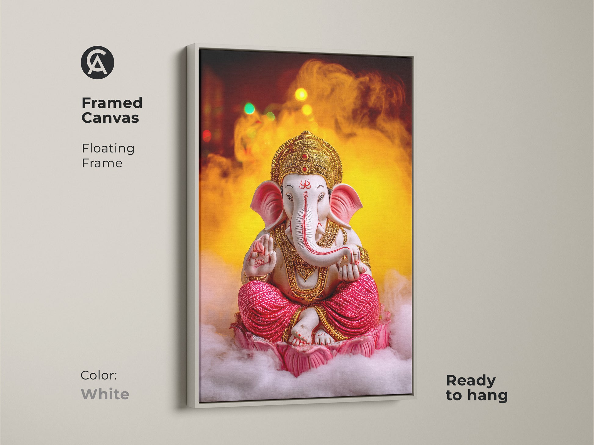 Framed canvas showing the Pink Gold Ganesha artwork with a white floating frame. This spiritual lotus art is ready to hang. It offers Hindu mythology in a clean modern style. The eclectic decor enhances meditation room ambiance. This Ganesha print makes a thoughtful housewarming gift.