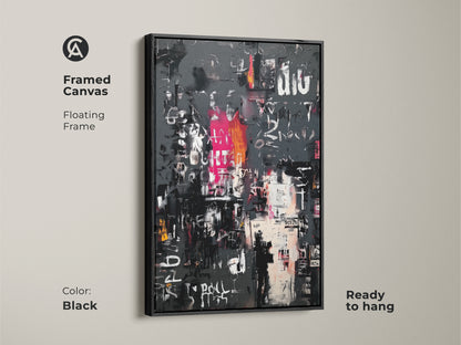 Framed canvas featuring abstract artwork. The floating frame is black. The artwork includes a gray background with white pink and black markings. This framed canvas is ready to hang. Elevate your home decor with this stylish art.