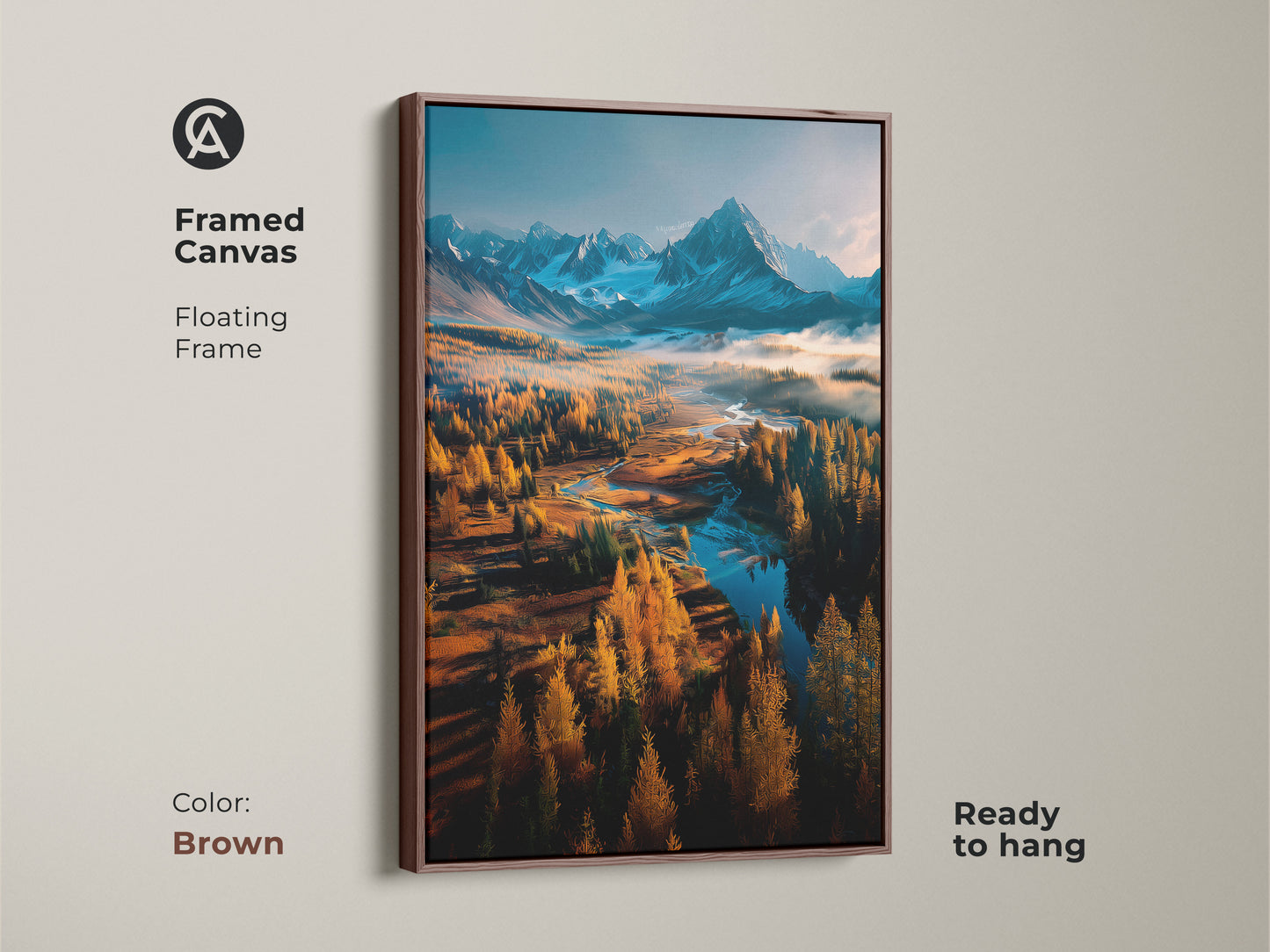 Framed canvas art with a brown floating frame. It features a mountain landscape with golden trees. A winding river and snow-capped mountains add to the beauty. This ready-to-hang artwork enhances any room decor. Perfect wall art.