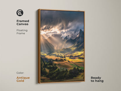 Antique gold framed canvas print of a mountain landscape. Golden valley sunbeam art enhances the rustic charm. Ready to hang for easy decor. Ideal for nature-inspired homes. Bring the outdoors in with this scenic valley painting. A great gift for hikers.