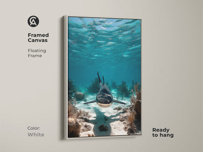 Framed canvas with a white floating frame featuring a realistic shark. This coastal art adds a fresh touch to your walls. Ready to hang. This blue teal coral reef artwork is perfect for nautical bedroom decor and a great gift for divers.
