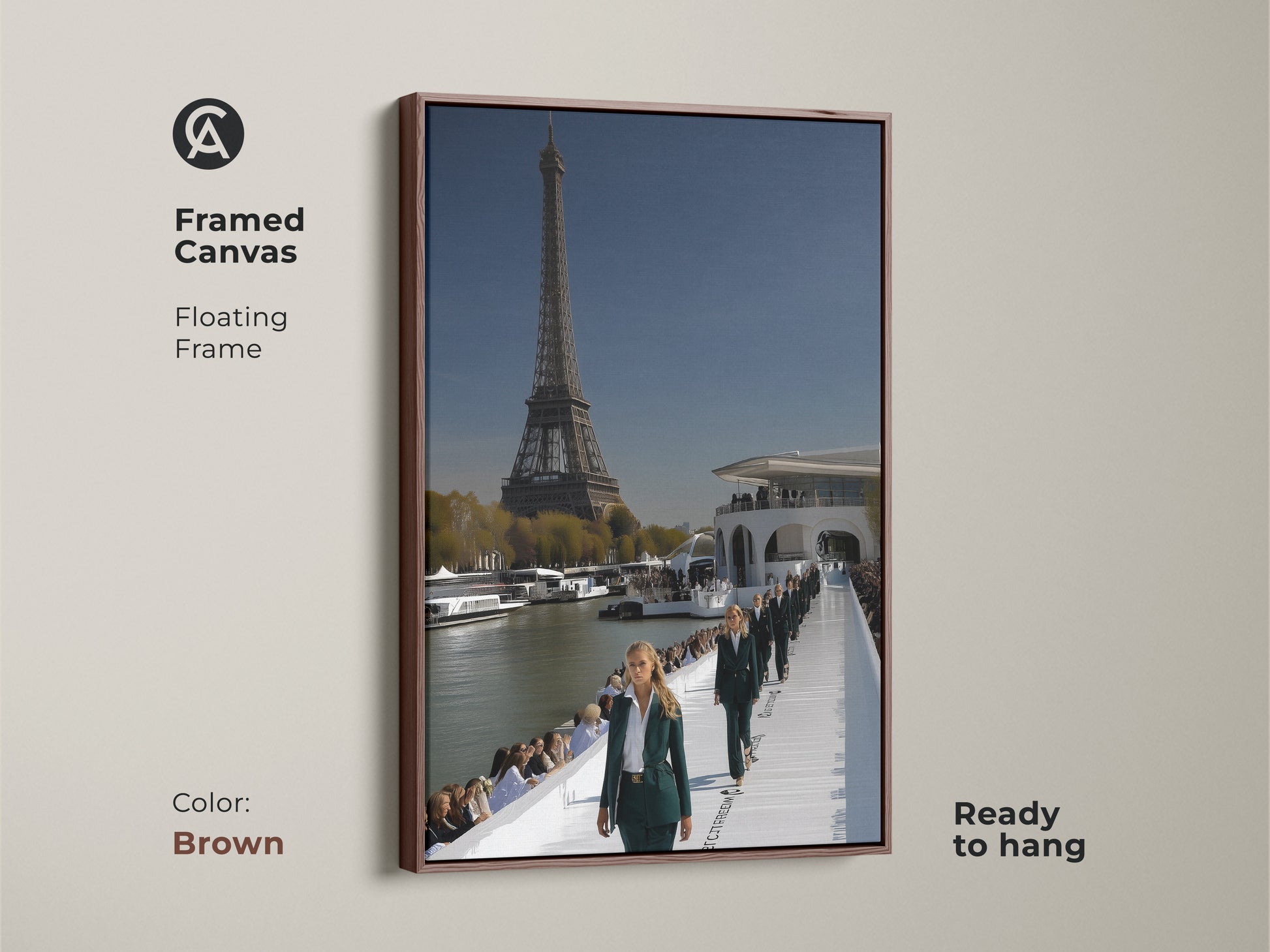 Eiffel Tower cityscape canvas artwork in a brown floating frame. It shows a Parisian fashion runway and show. This contemporary piece features sky blue and deep green tones. It offers haute couture and Parisian elegance to your home or workspace. Perfect for chic entryway decor or modern office wall art.