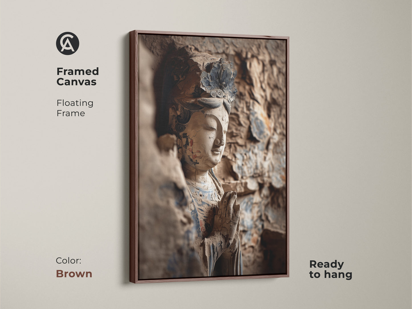A framed canvas features a Buddha statue artwork. The floating frame is brown. This terracotta beige wall decor is ready to hang. It's an inspiring spiritual wall hanging.