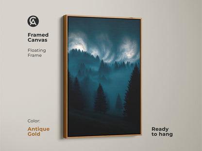 Modern framed canvas art of a misty pine forest. The midnight blue landscape is set in an antique gold floating frame. Ready to hang for serene home decor.