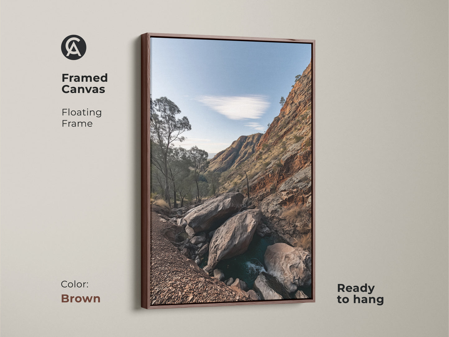 Framed canvas art of a Rocky Mountain landscape with a brown floating frame. This rustic wall decor features sky blue nature photography and gnarled trees. Ready to hang this is a perfect hiker gift. Enhance your space with this scenic mountain view.