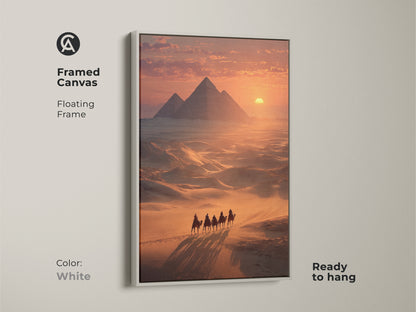 Framed canvas print of Egyptian Pyramids & Camel Caravan with a floating white frame. This piece is ready to hang. The white frame offers a clean modern look. The sunset camel ride canvas artwork is a unique addition to any space. It is an ideal gift for adventure seekers.