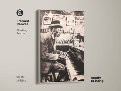 This framed canvas print features a floating frame in white showcasing a man playing piano at a bar. Ready to hang this artwork adds musical elegance to any room. The white frame enhances the monochrome art. Elevate your home decor with this stylish piano art print.