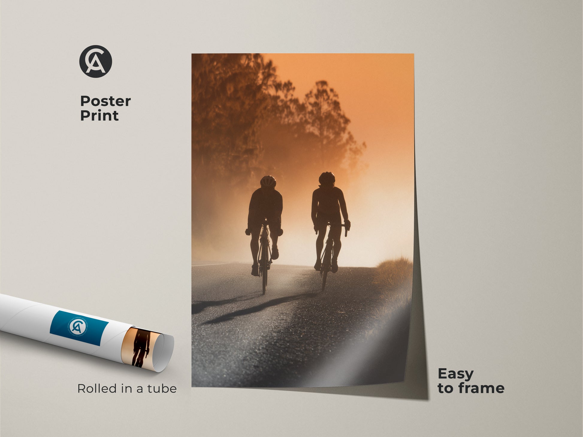 Poster print of a cycling couple on an amber road. Rolled in a tube for easy framing. This modern landscape art adds a touch of sports adventure to any room. A unique housewarming gift for cyclists. Perfect for modern office art.