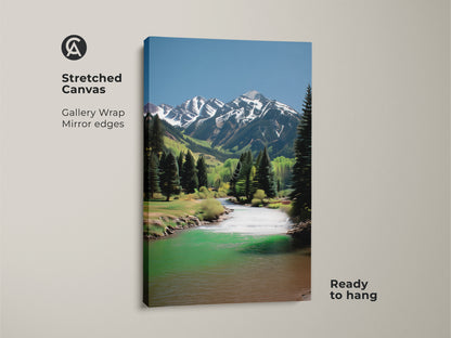 Stretched canvas art featuring a mountain river landscape. This gallery-wrapped print has mirror edges and is ready to hang. The scenic artwork captures snowy peaks and lush pine trees. Perfect rustic home decor.