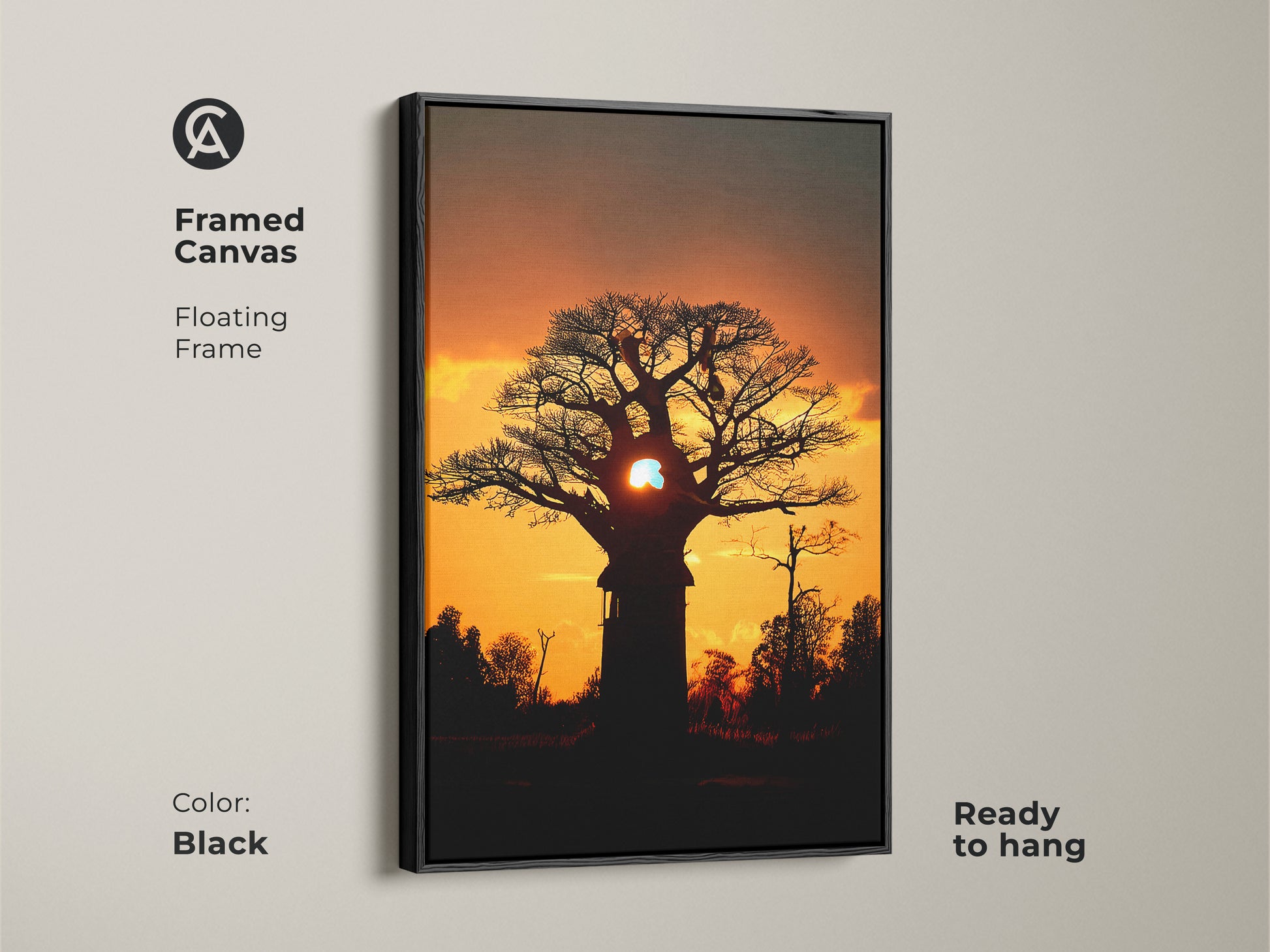 Framed canvas featuring a silhouetted african sunset landscape. Black floating frame complements the orange yellow nature print. Ready to hang as bedroom wall decor sunset. A unique piece of residential landscape art. This baobab tree art is perfect for an eclectic home.