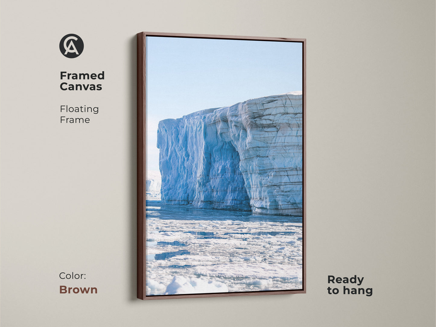Brown framed canvas featuring a minimalist iceberg. The light blue canvas art is ready to hang. It brings a serene glacier scene to your bedroom. This contemporary wall decor is perfect as a housewarming gift.