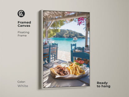 Framed canvas print of a Greek gyros with a coastal view. The white floating frame is ready to hang. This piece would be ideal as a housewarming gift art or art for dining area.