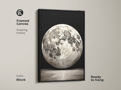 Black framed canvas abstract moon artwork. This floating frame features contemporary home decor. The modern gray space artwork is ready to hang and perfect for living room space art.