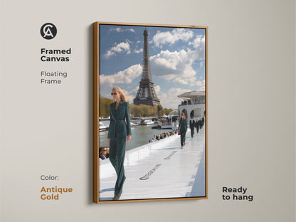 Framed canvas print of a Parisian runway show with an antique gold floating frame. The artwork displays models in teal green outfits with the Eiffel Tower in the distance. This contemporary ready to hang piece brings a touch of glamour to any space. Ideal for fashion and Paris enthusiasts.