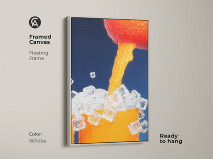 Framed canvas features an abstract orange juice pour. The white floating frame offers a clean modern look. This contemporary kitchen art is ready to hang. Ideal for minimalist home decor and beverage art lovers.