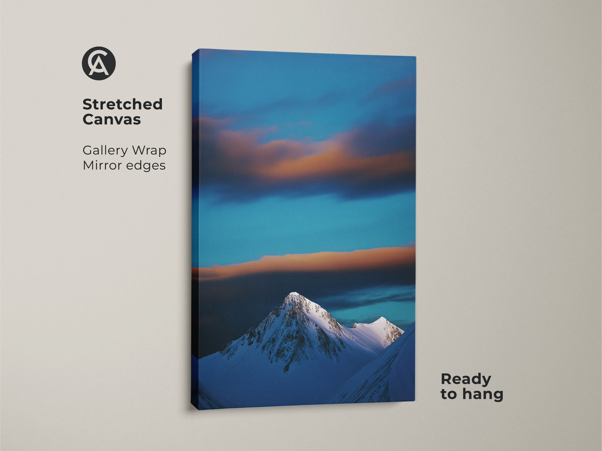 This stretched canvas features a winter landscape print with a snowy mountain. Blue sky and clouds create a serene nature photography decor piece. Ready to hang this minimalist mountain art is perfect for a contemporary bedroom.