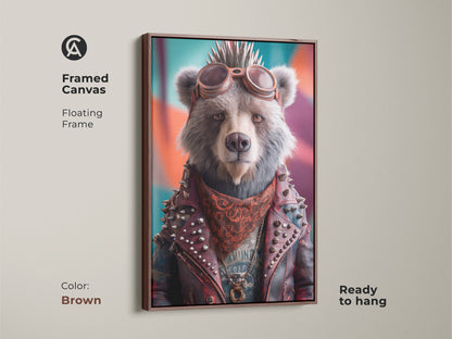 Framed canvas featuring a punk bear in a biker jacket with a brown floating frame. Ready to hang eclectic wall art. A unique animal portrait and rock and roll canvas print. Perfect as a birthday gift for him. The goggles bear art makes it a cool man cave art.