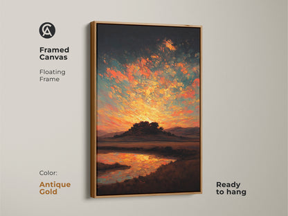 A framed canvas displays an impressionistic sunset landscape. The floating frame is antique gold. It is ready to hang. This wall decor artwork features orange yellow and teal.