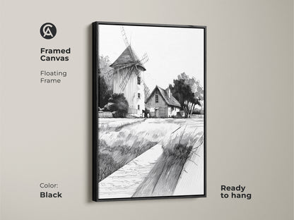 Framed canvas featuring farmhouse windmill art. A black floating frame enhances the black and white ink drawing. Ready to hang this country landscape wall art adds rustic charm. Perfect farmhouse style wall art.